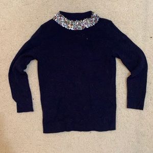 blue sweater with jewel collar